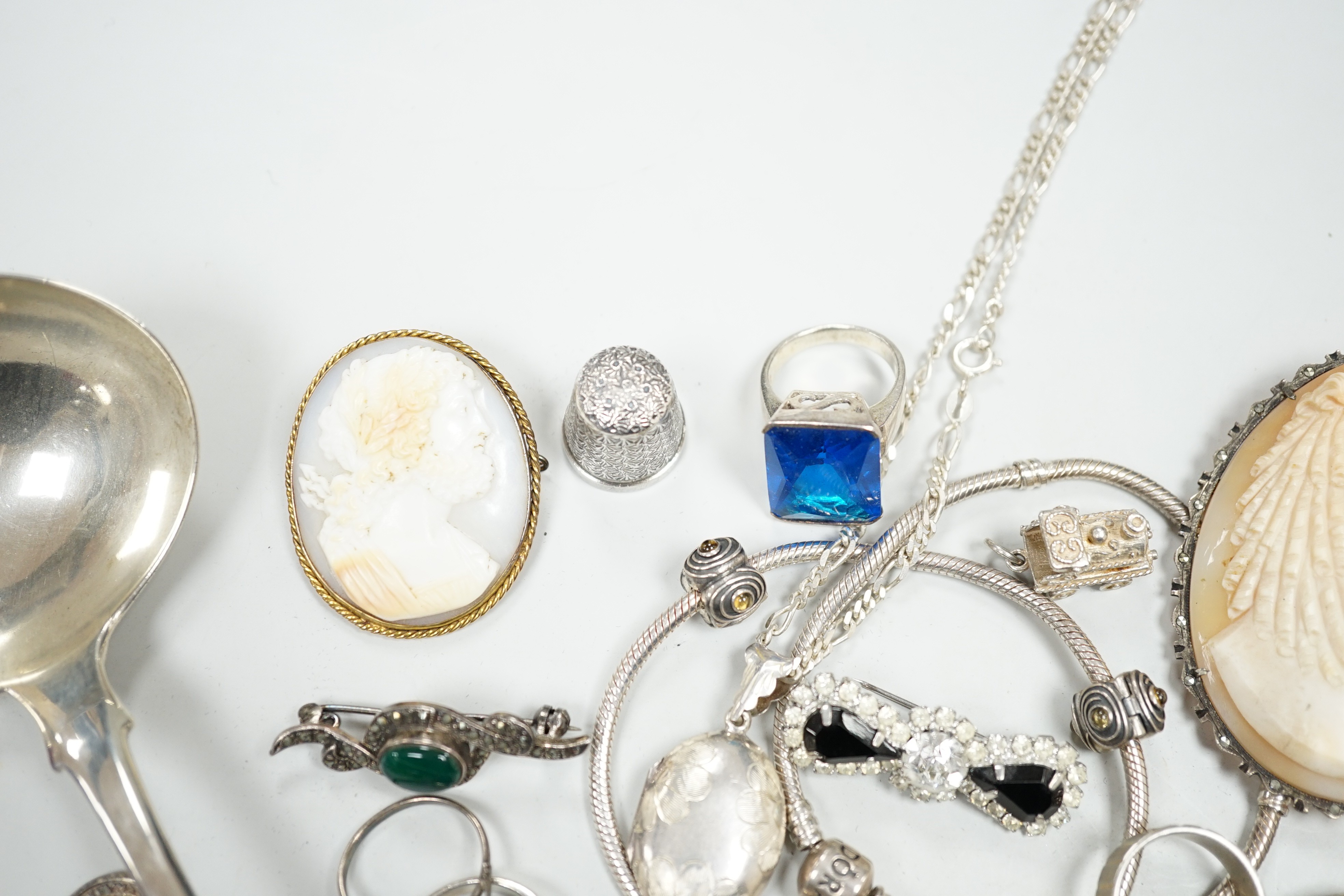 A George III silver sauce ladle, London, 1803 and a quantity of assorted jewellery including two white metal charm bracelets.